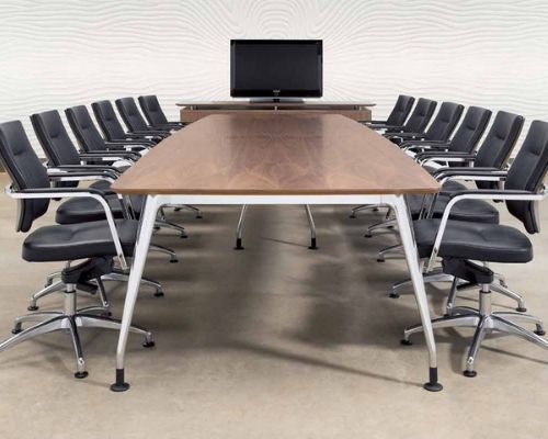 Conference meeting table with chairs and monitor