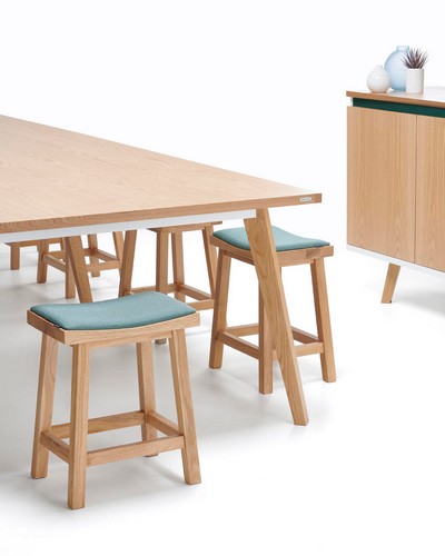 Karin low stools in oak with an upholstered seat pad