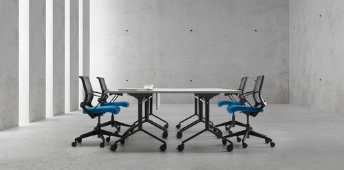 Tilt-top tables with Cube meeting chairs