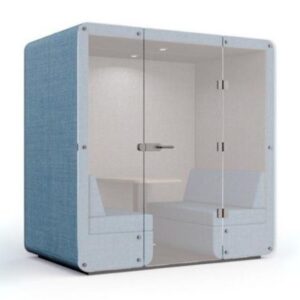 Light blue fabric office meeting pod with glass walls two interior benches and a small table.